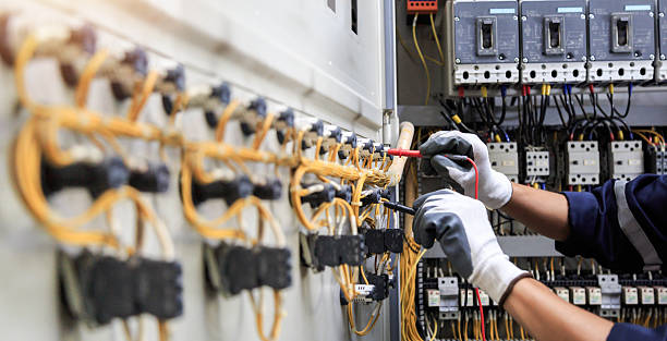 Professional Electrician technician working in Golden Shores, AZ